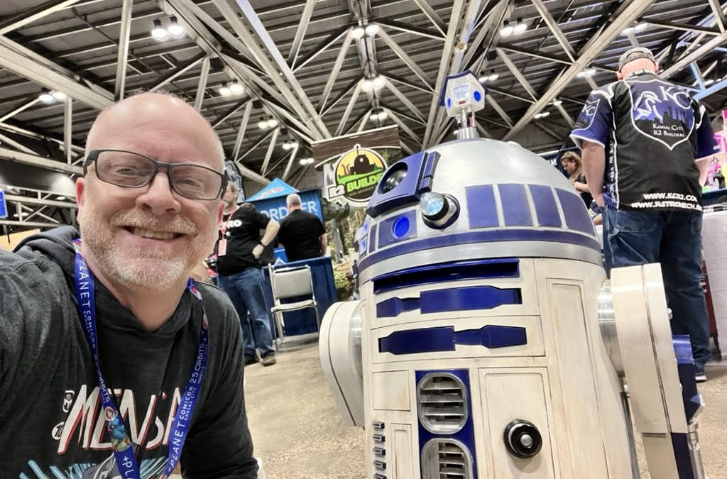 David Leavitt with R2D2 (Star Wars) at Planet Comicon 2024