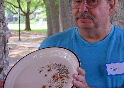 Tony with an Auction item up for bidding on