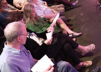 MAM group sitting together at Escape to Margaritaville community theater