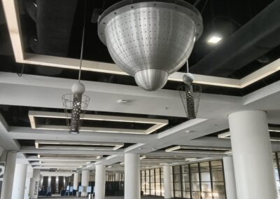 Satellite decor hanging from convention center ceiling