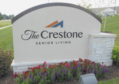 The Crestone Senior Living of Olathe and its monument sign